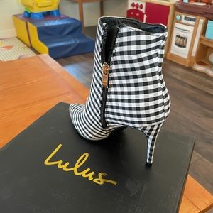 Black and white boot heal- never worn!